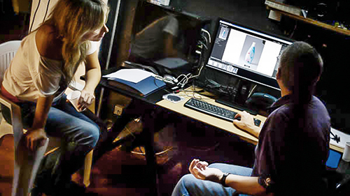 Clases particulares fotografia Mariano Molinari asesorando a fotógrafa en edición de imagen